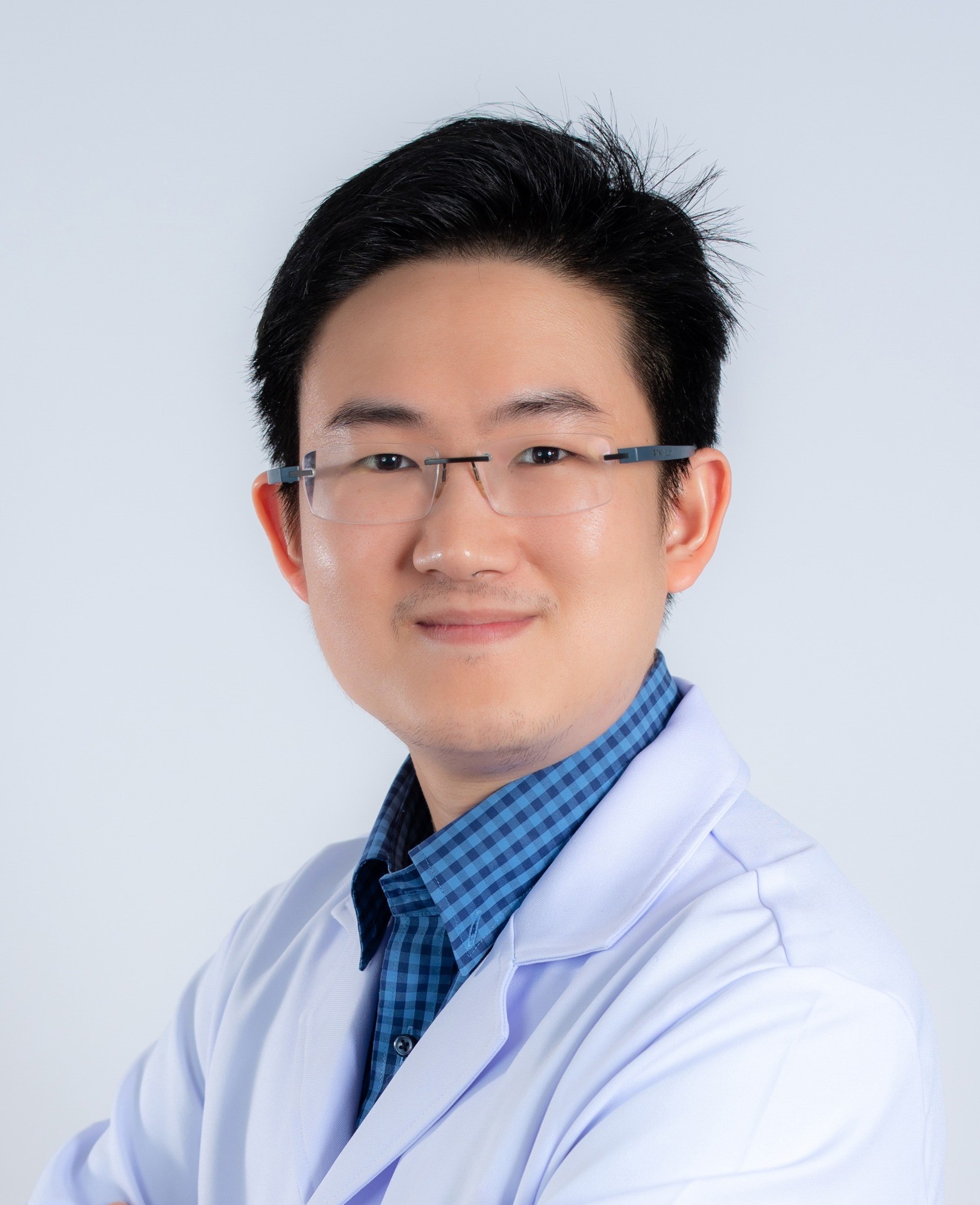 Thanat Assavisanu,M.D.