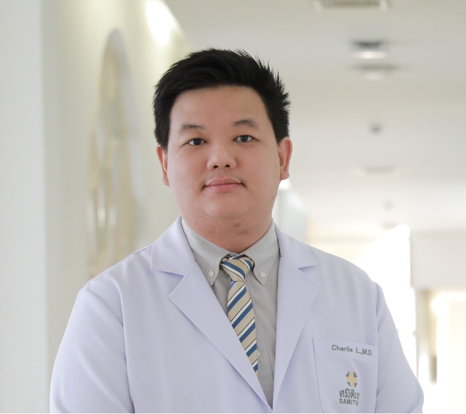 Charlie Laohapand,M.D