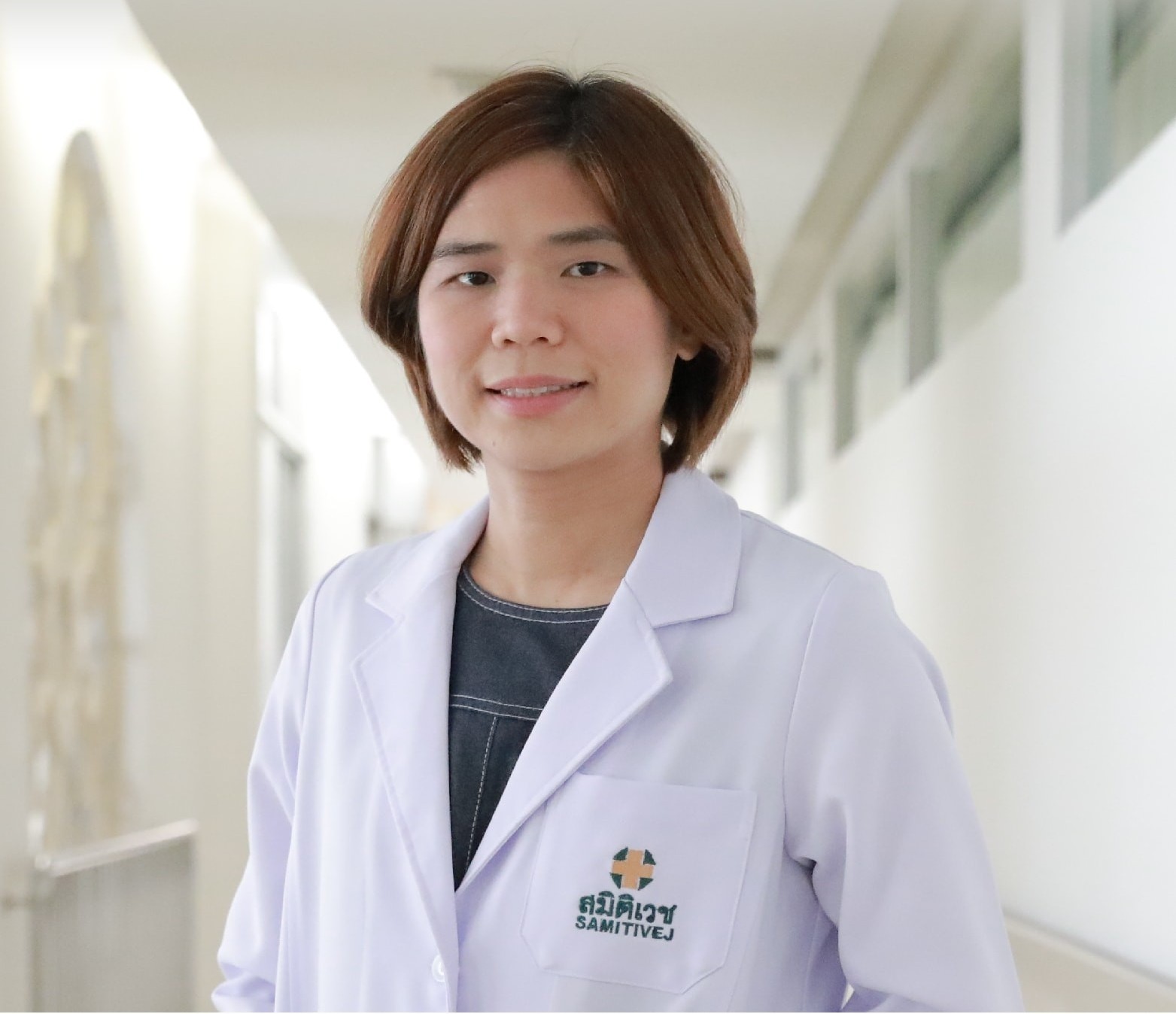 Morakod Deesomsak,M.D.