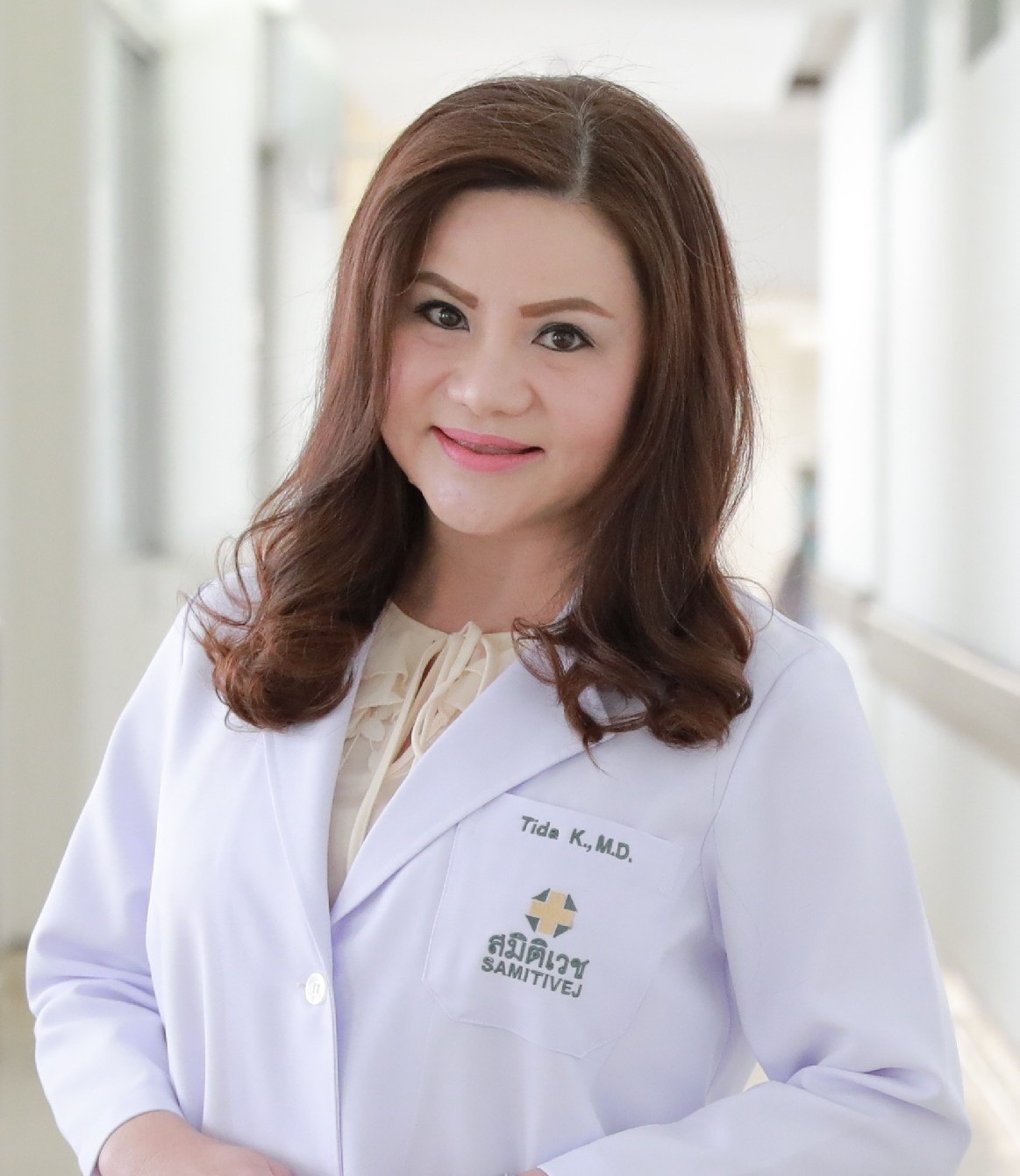 Tida Khomsiri, M.D.
