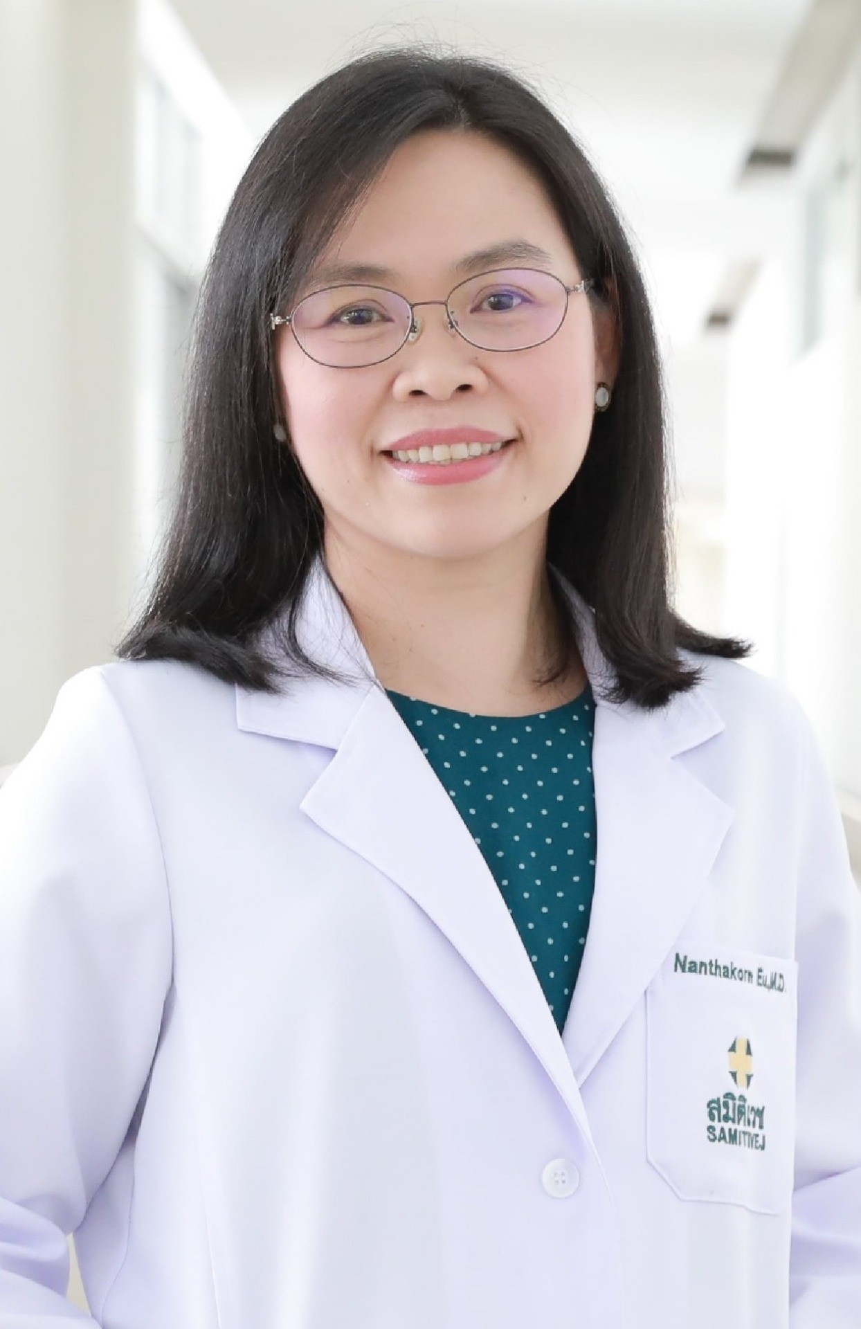 Nanthakorn Eu-ahsunthornwattana,M.D.