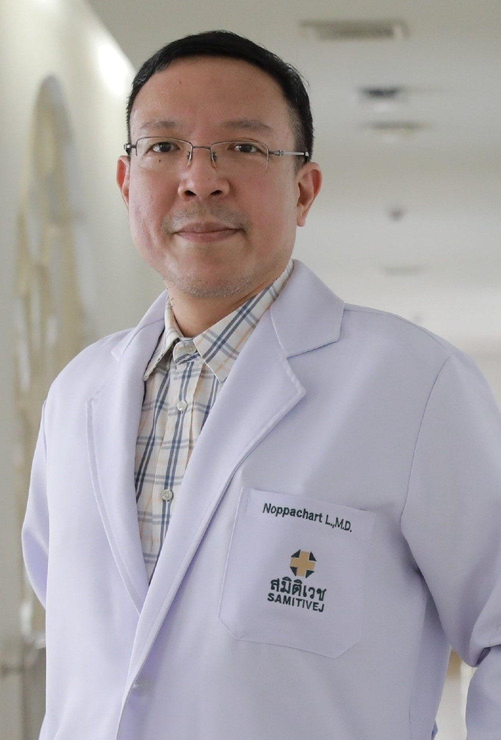Associate Prof.Noppachart Limpaphayom